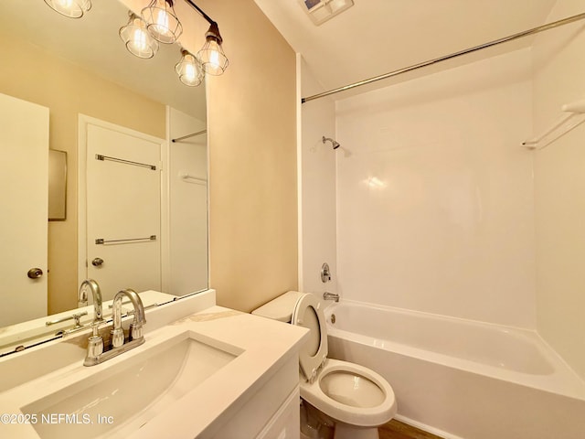 full bathroom with vanity, toilet, and shower / bathing tub combination