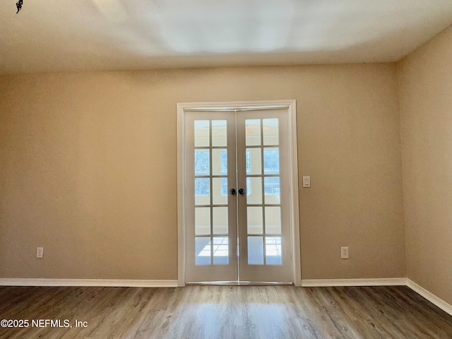 doorway to outside with hardwood / wood-style flooring and french doors