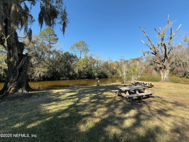 view of yard with a water view