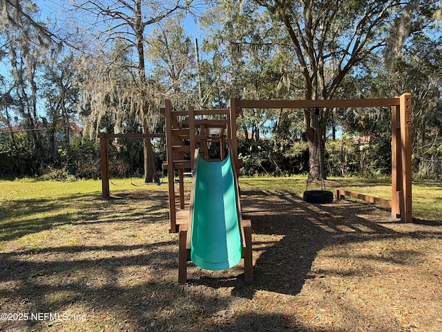 view of playground featuring a yard