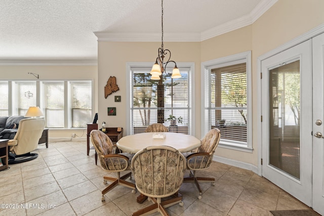 tiled dining space with an inviting chandelier, crown molding, and a textured ceiling