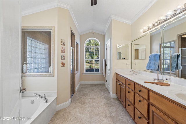 bathroom featuring vanity, crown molding, vaulted ceiling, and shower with separate bathtub