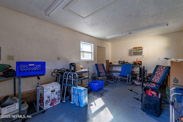 interior space featuring an AC wall unit