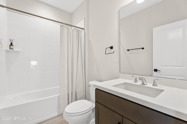 bathroom with shower / tub combo with curtain, vanity, toilet, and wood finished floors