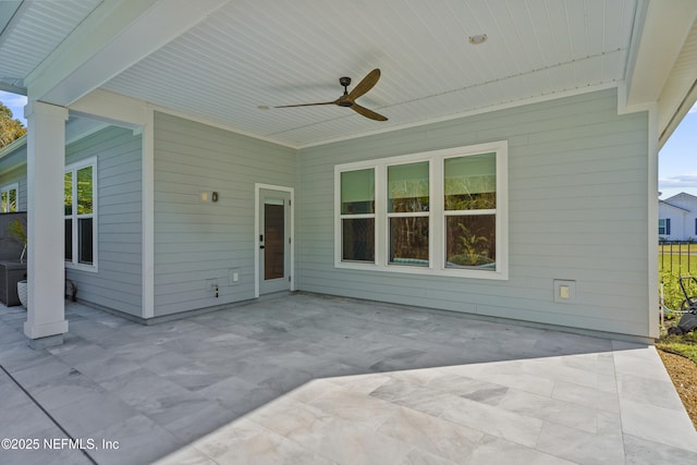 view of patio / terrace featuring ceiling fan