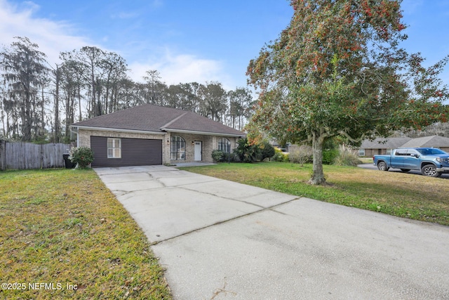 single story home featuring a front lawn