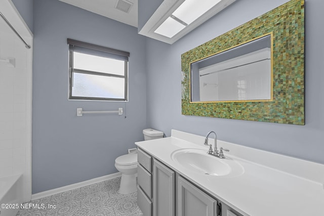 full bathroom featuring tile patterned floors, vanity, toilet, and shower / washtub combination