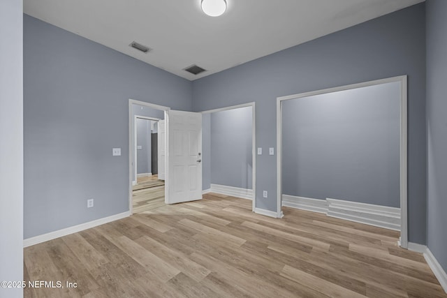 unfurnished bedroom with light hardwood / wood-style floors