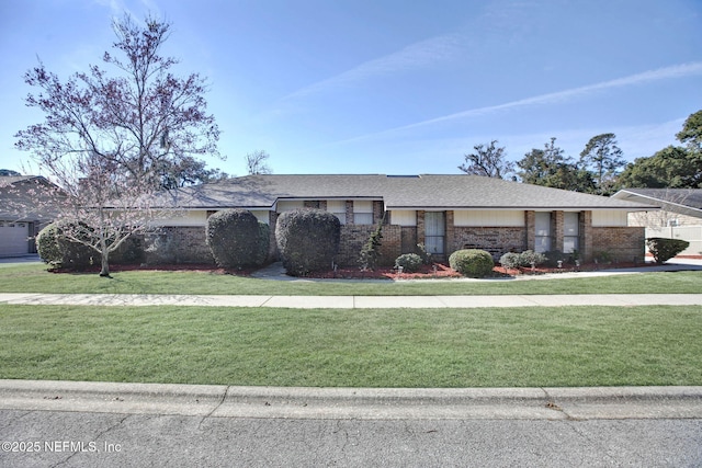 view of front of home with a front lawn