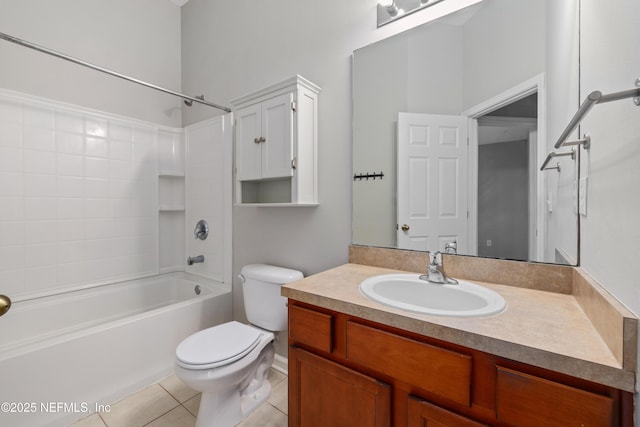 full bathroom featuring washtub / shower combination, tile patterned floors, toilet, and vanity