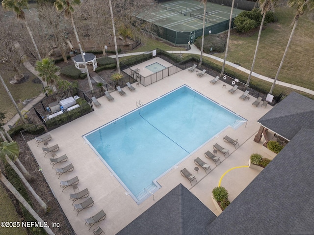 view of swimming pool featuring a patio area