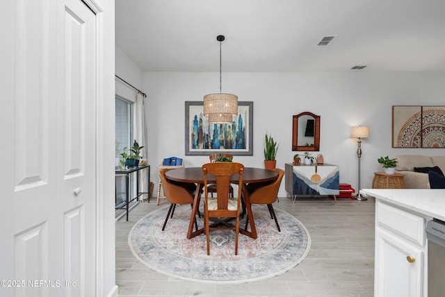 dining area featuring light hardwood / wood-style flooring