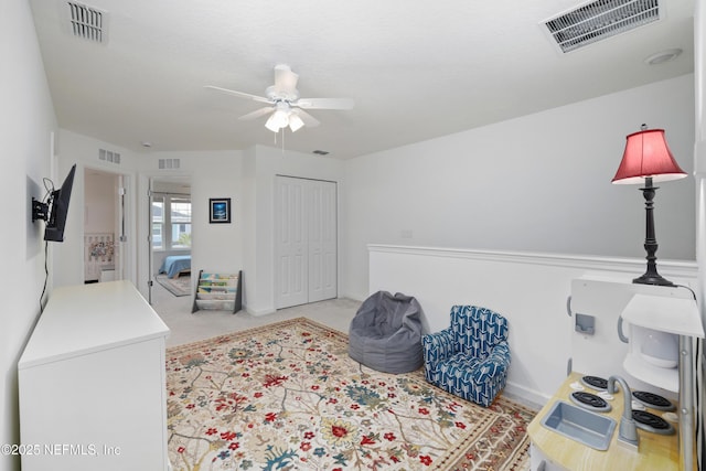 interior space featuring ceiling fan