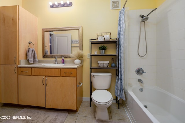 full bathroom with vanity, tile patterned floors, toilet, and shower / bath combo with shower curtain