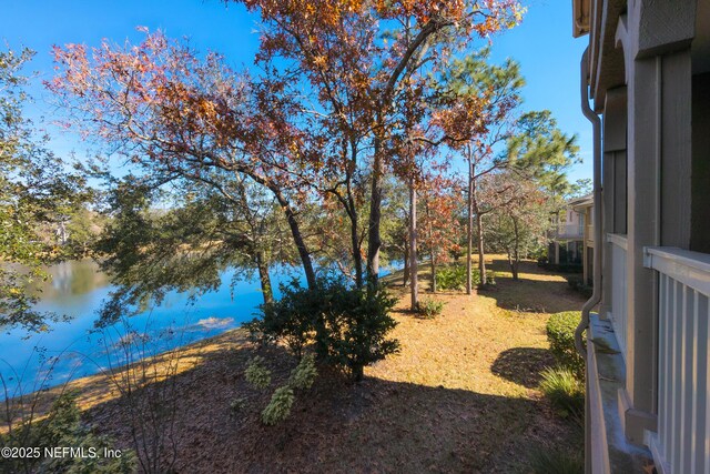 view of yard with a water view