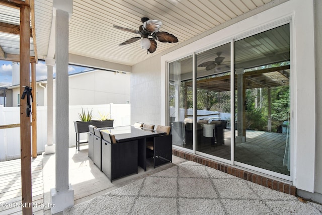 view of patio featuring ceiling fan