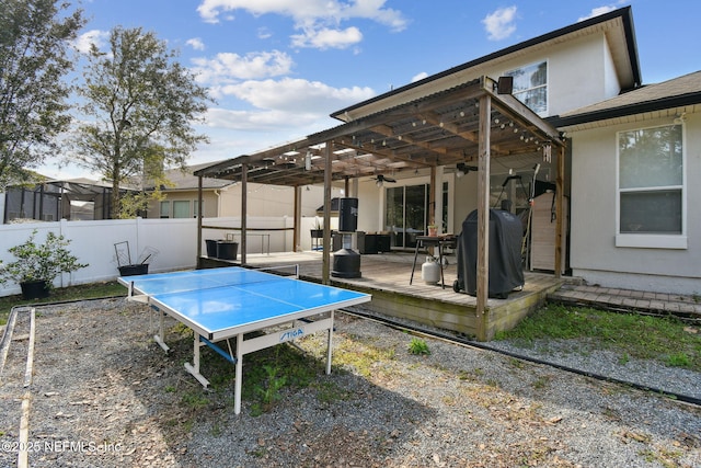 view of patio / terrace featuring ceiling fan, a pergola, a jacuzzi, and area for grilling