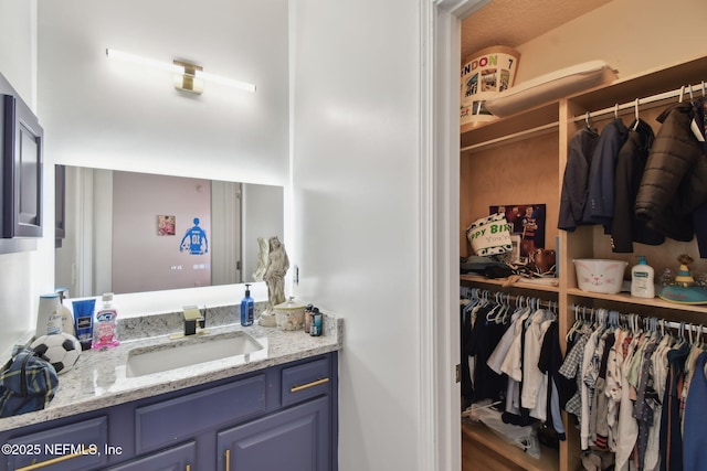 bathroom featuring vanity