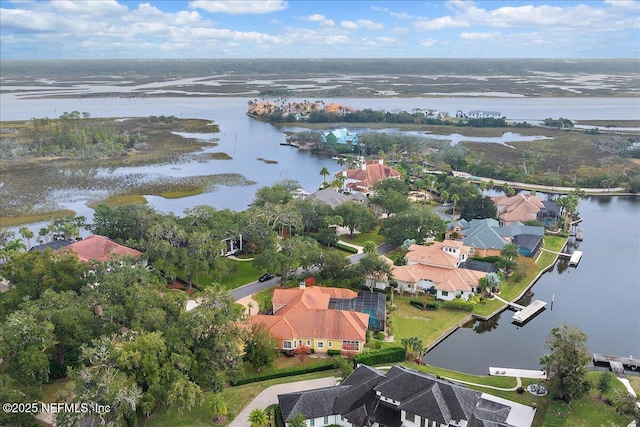 aerial view featuring a water view