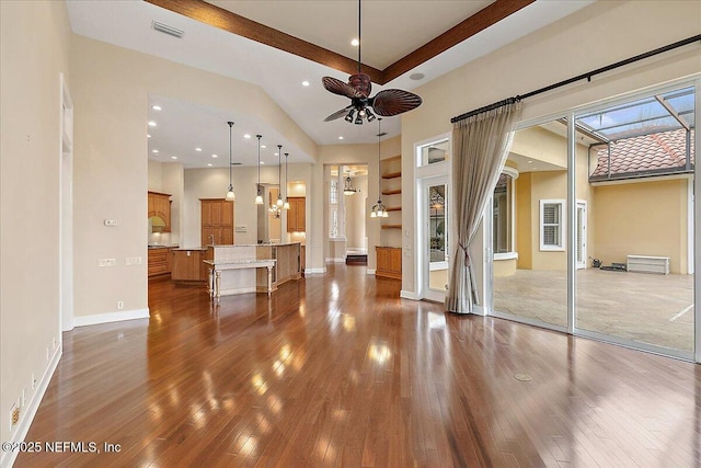 unfurnished living room with visible vents, recessed lighting, baseboards, ceiling fan, and dark wood-style flooring