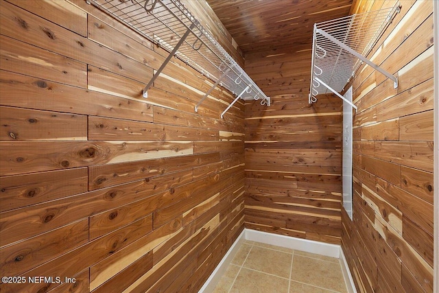 spacious closet featuring tile patterned floors