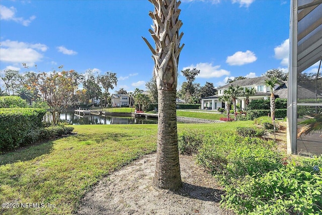 view of yard with a water view