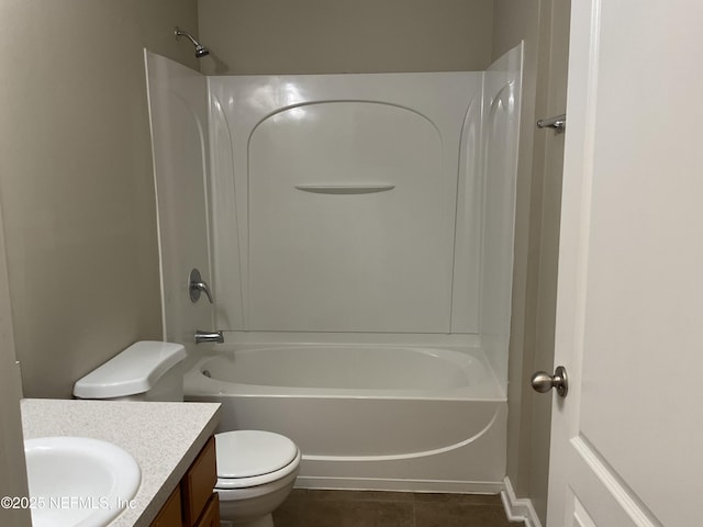 full bathroom featuring vanity, tile patterned floors, toilet, and bathtub / shower combination