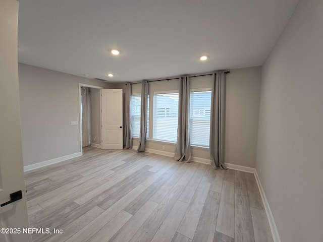 empty room featuring light hardwood / wood-style flooring