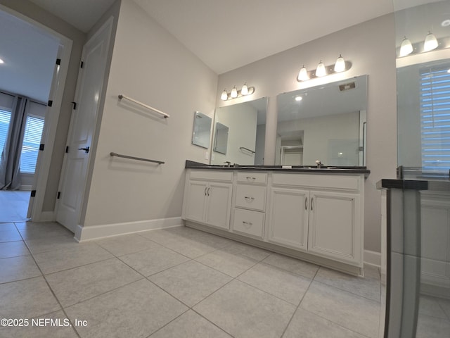 bathroom featuring vanity and tile patterned flooring