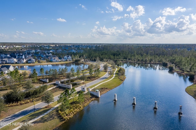 bird's eye view with a water view and a residential view