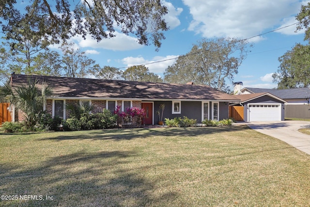 ranch-style home with a garage and a front yard