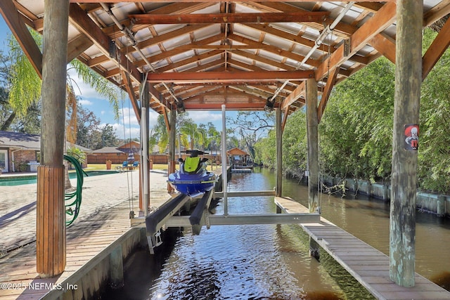 dock area featuring a water view