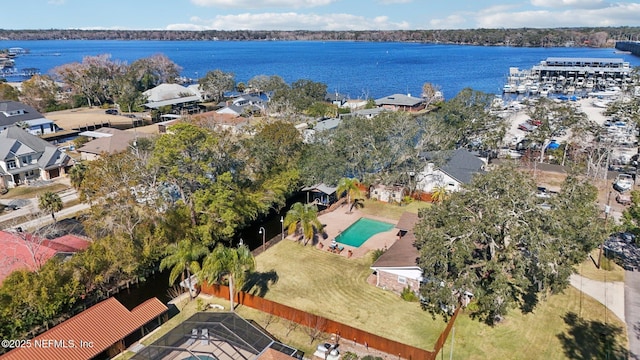 birds eye view of property with a water view