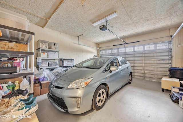 garage featuring a garage door opener