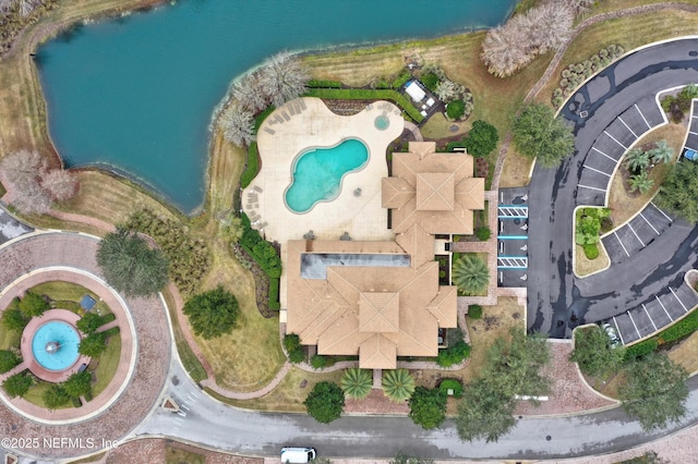 drone / aerial view with a water view