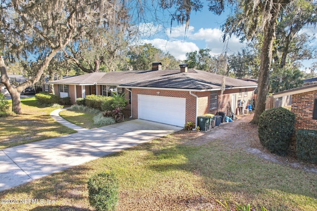 ranch-style house featuring a front lawn, concrete driveway, an attached garage, brick siding, and a chimney