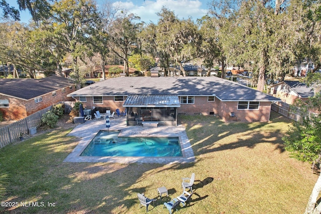 view of pool with a patio area, a fenced in pool, a fenced backyard, and a lawn