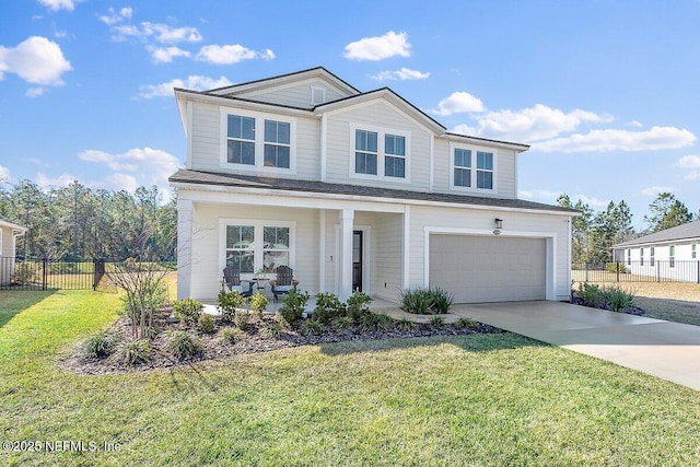 view of front property with a garage, covered porch, and a front lawn