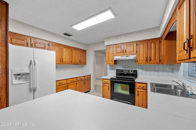 kitchen featuring tasteful backsplash, sink, white fridge with ice dispenser, a textured ceiling, and black / electric stove