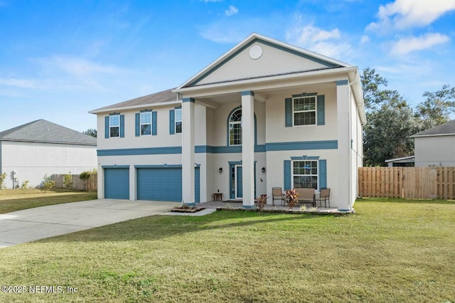 neoclassical / greek revival house with a garage, a front lawn, and a porch