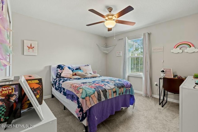 bedroom with washer / clothes dryer, ceiling fan, and carpet flooring