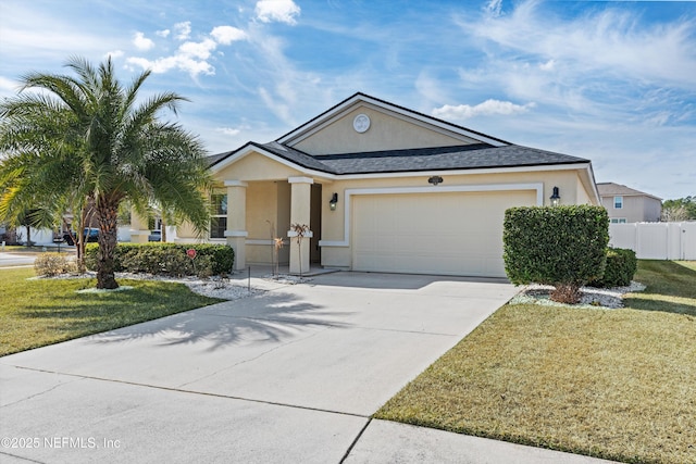 view of front facade with a garage and a front lawn