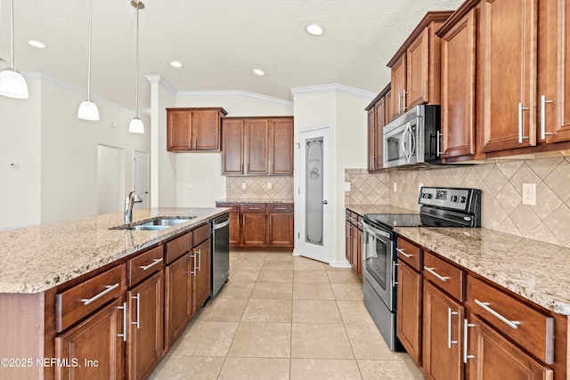 kitchen with crown molding, appliances with stainless steel finishes, sink, and decorative light fixtures