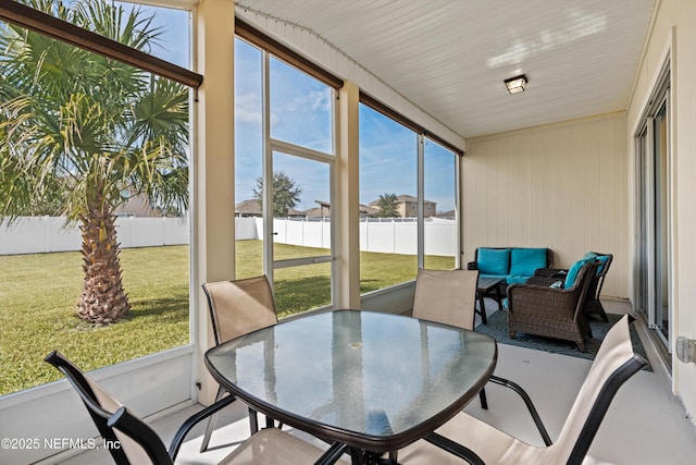 sunroom / solarium with a healthy amount of sunlight