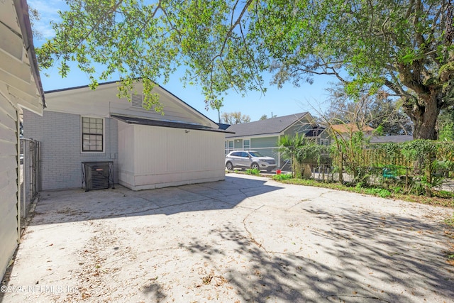 view of home's exterior with central AC