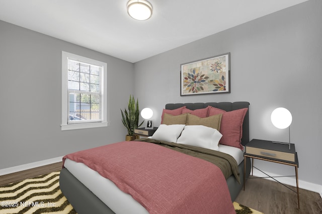 bedroom featuring hardwood / wood-style floors