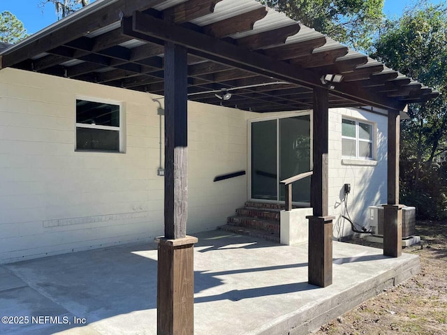 view of patio with central AC