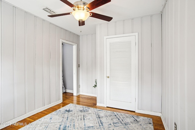 bedroom featuring hardwood / wood-style flooring and ceiling fan