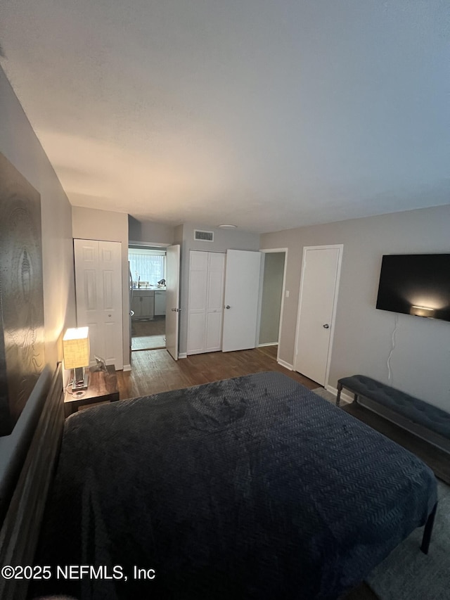 unfurnished bedroom featuring hardwood / wood-style floors