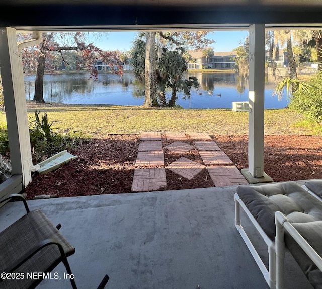 view of patio / terrace with a water view